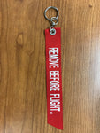 REMOVE BEFORE FLIGHT EAFB Ribbon Keychain